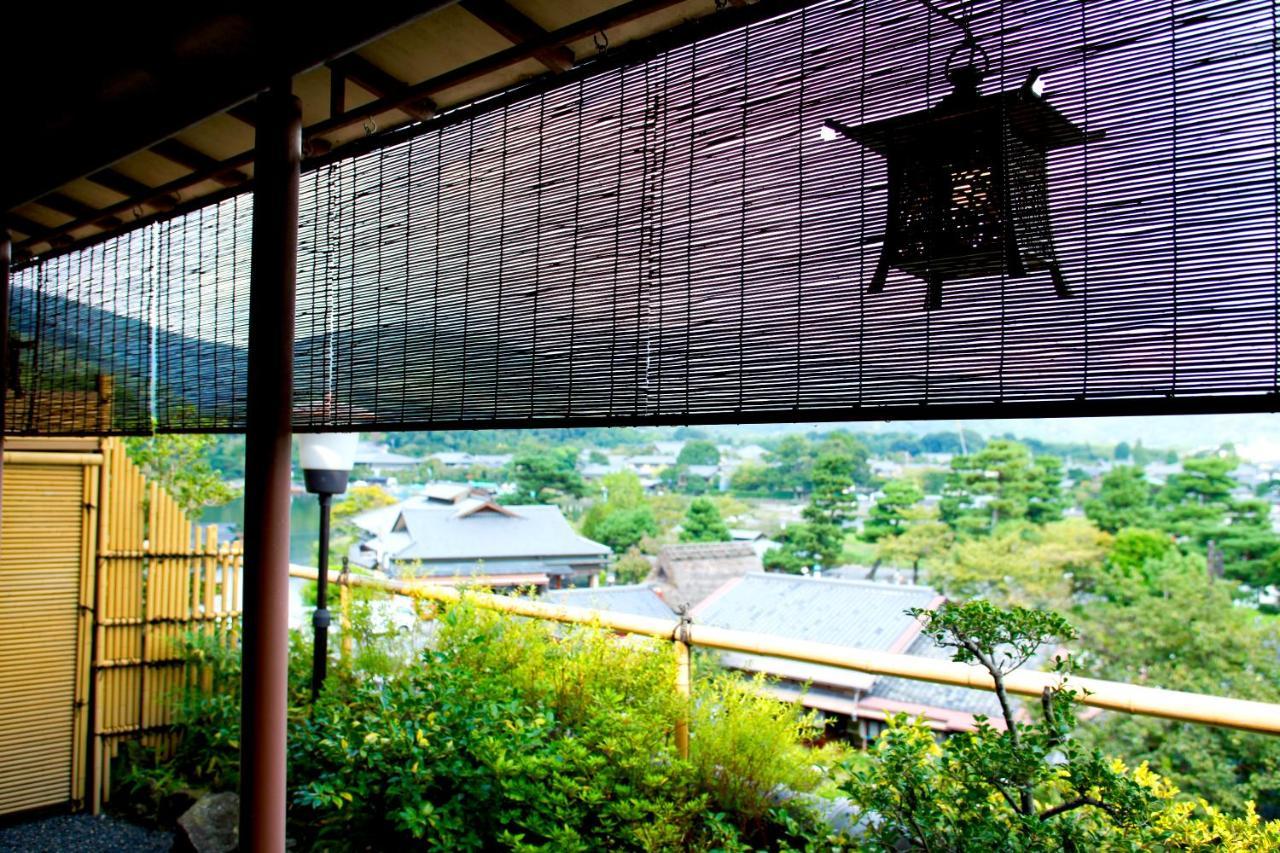 Kyoto Arashiyama Onsen Ryokan Togetsutei Екстериор снимка