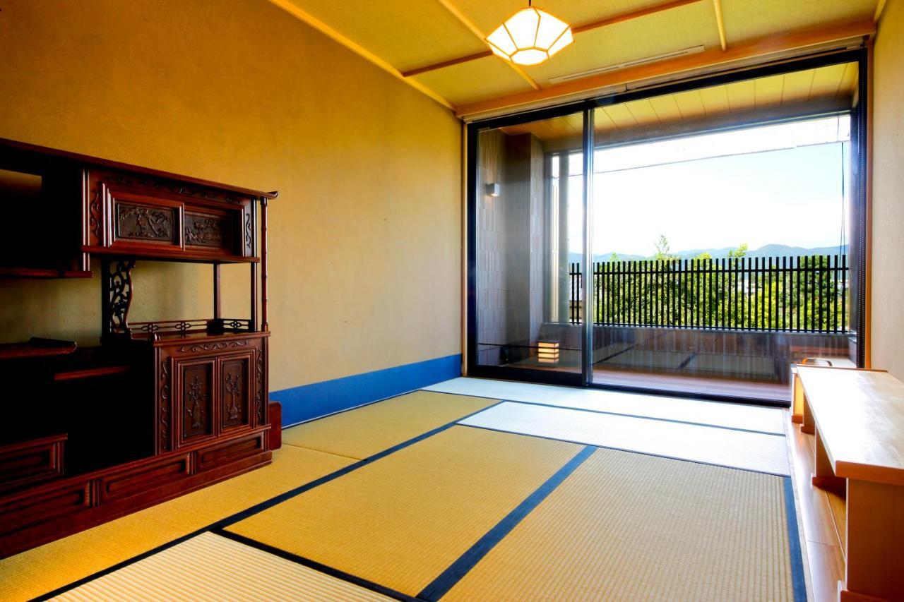 Kyoto Arashiyama Onsen Ryokan Togetsutei Екстериор снимка